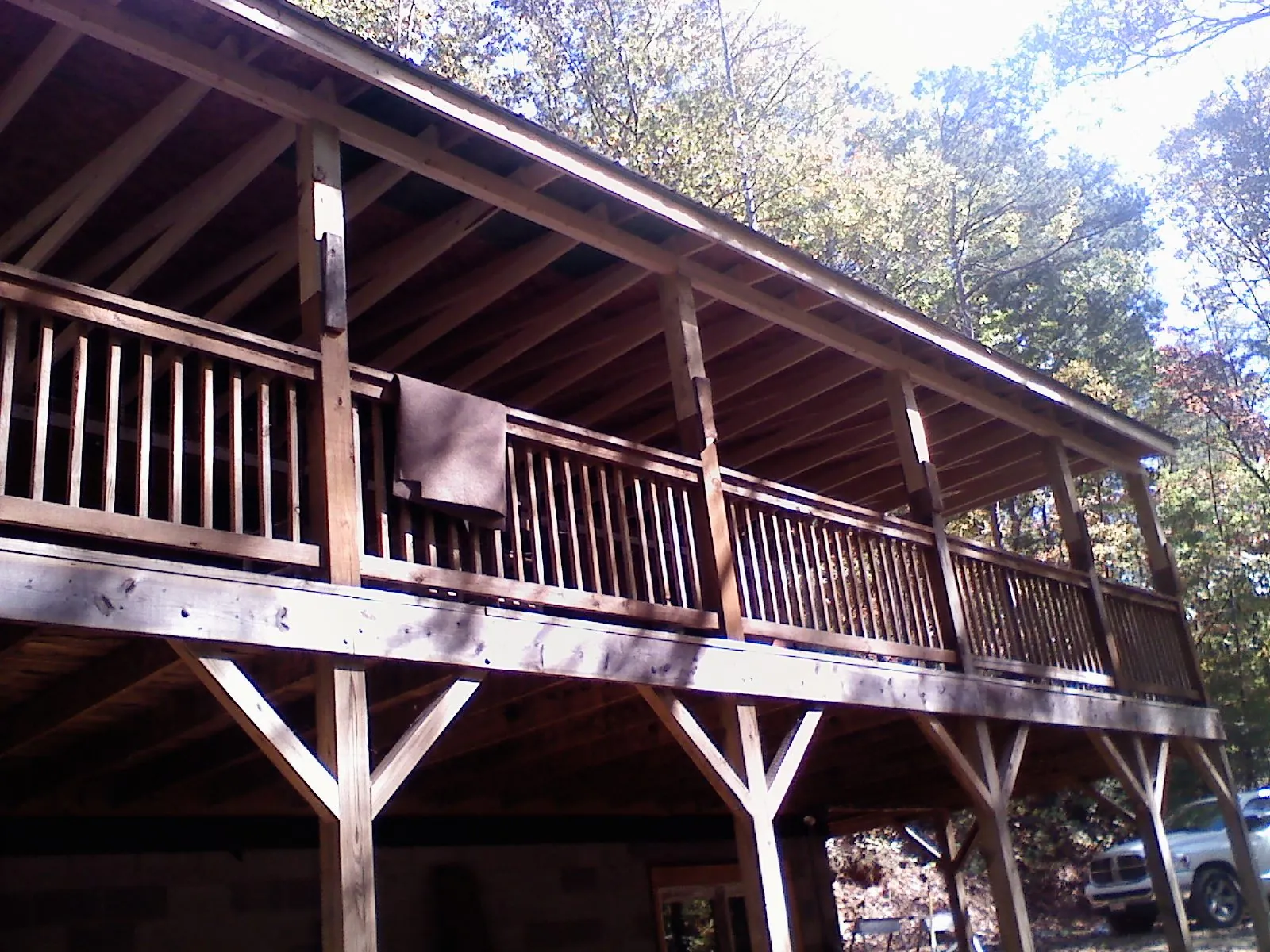 Timber framing under a new elevated porch and deck — Roof Leak Repair in Boulder Creek by Roofing Brothers